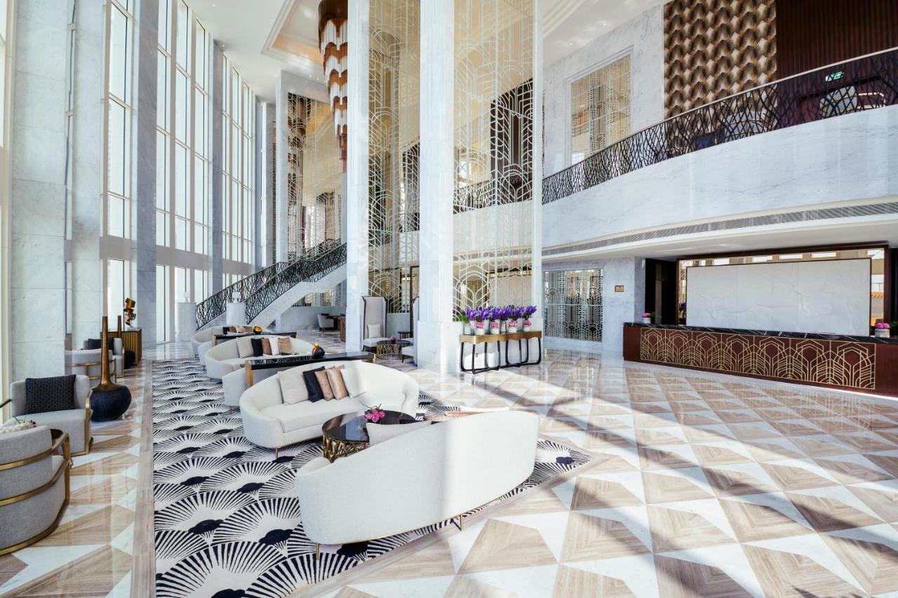 Wyndham Grand Doha West Bay Beach Экстерьер фото The lobby of the hotel