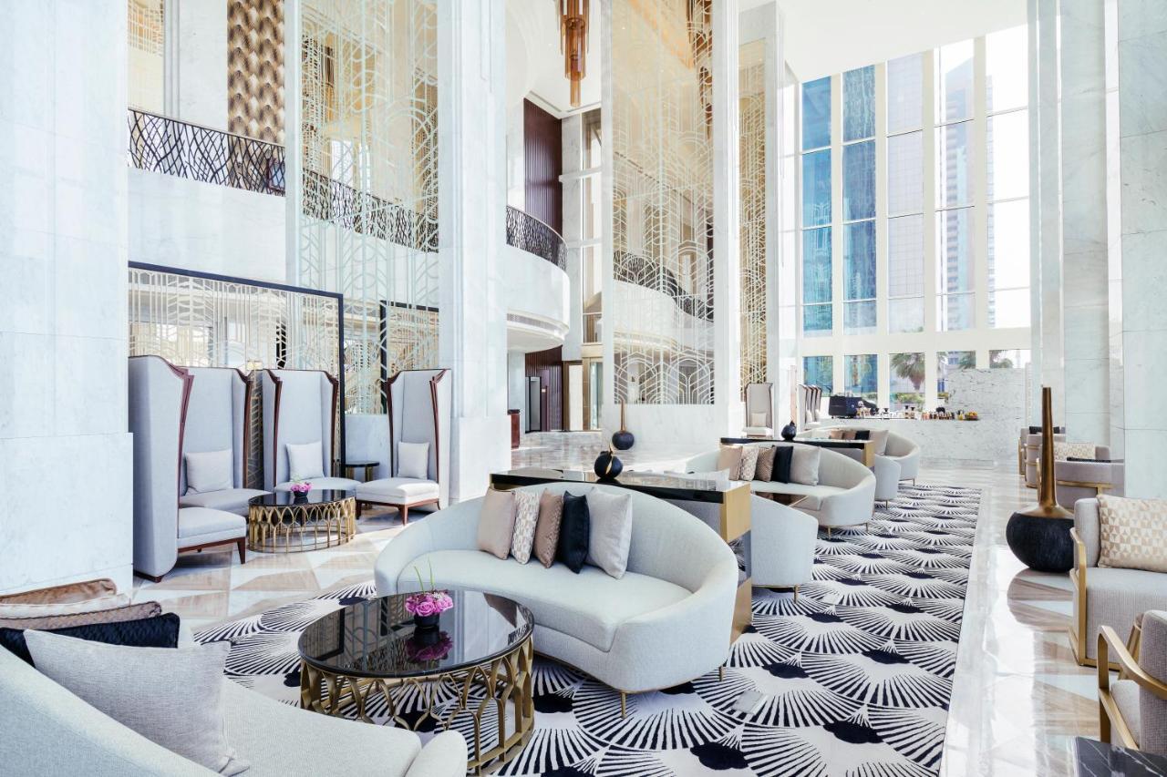 Wyndham Grand Doha West Bay Beach Экстерьер фото The lobby of the hotel